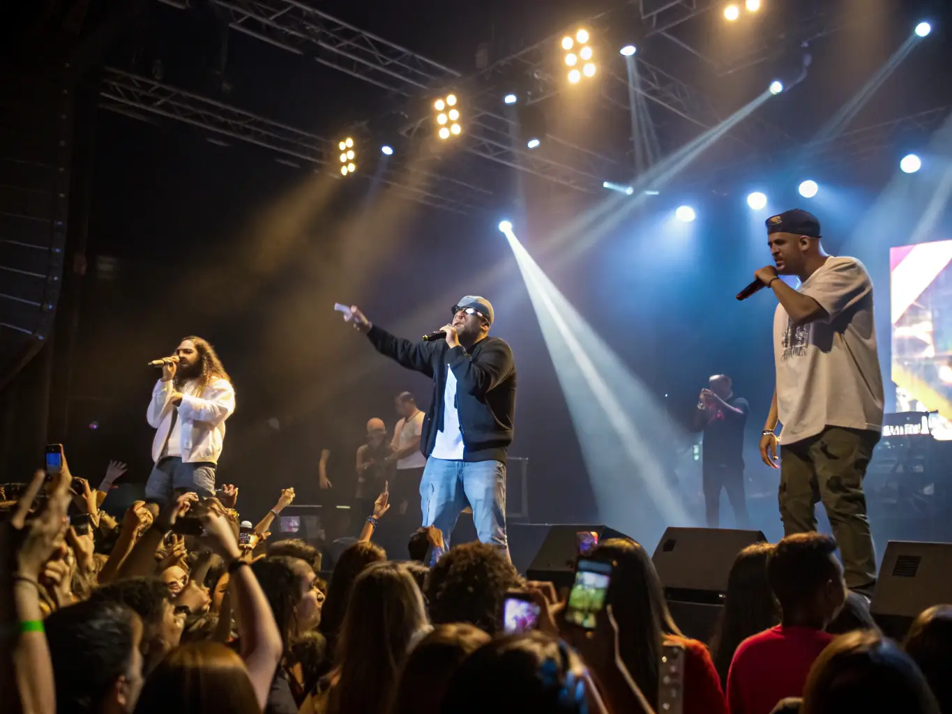 A photo of a Zimbuya performance featuring local and international artists collaborating on stage, showcasing the power of music to unite people.